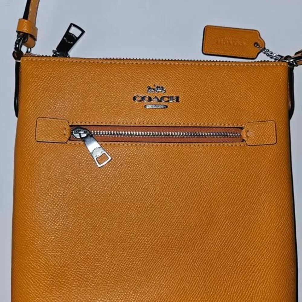 Coach Papaya Solid Crossbody Bag Zip Closure Adjustable Strap Inner Pockets